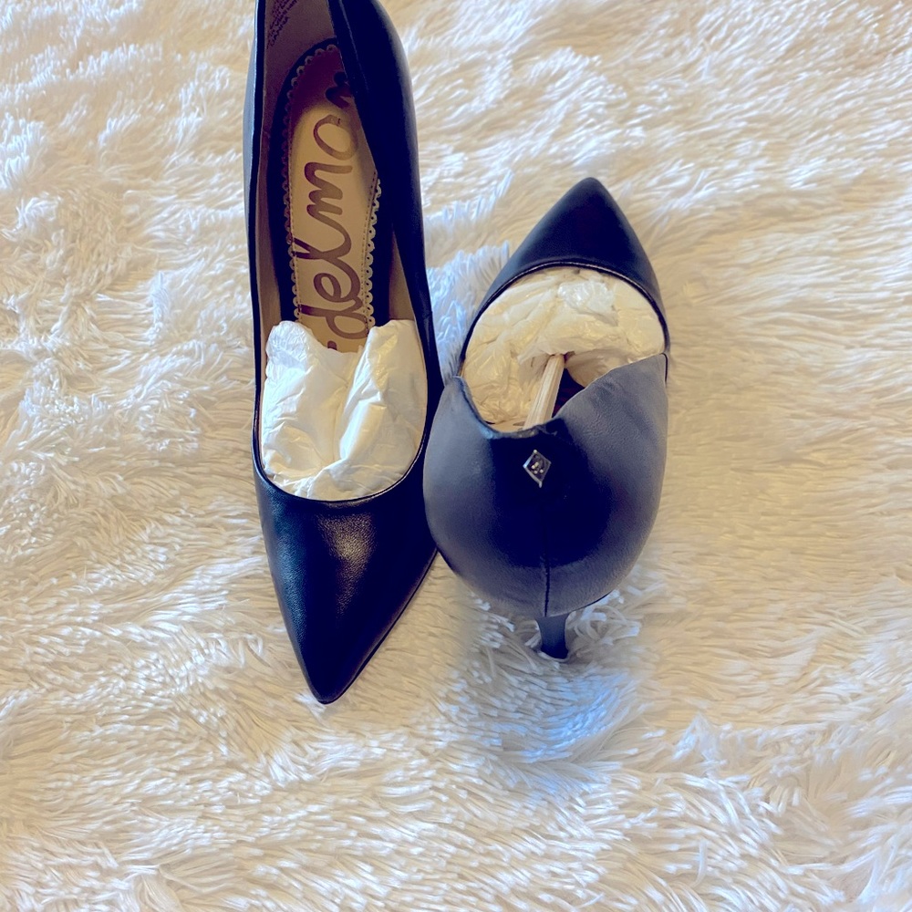 New- Never worn Designer pumps!